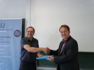 Prof. Dr. Thommes gratuliert Prof. Dr. Wahl